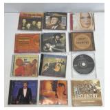 12 cds random artist, Elvis Presley, Leann rimes,