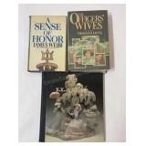 Assorted hardcover books.