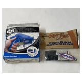 Bike chain cleaning tool + tie down extensions.
