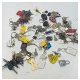 Assorted brass keys and key rings.