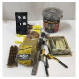 Assorted hand tools and hardware.