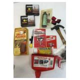 Various tools. Funnel, hammer, screw driver