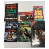 Assortment of books. Helpful first aid book and