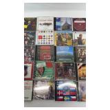 An assortment of CDs, many different types.