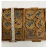 Vintage wooden coaster collection with holder.