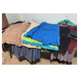 Group of Womenï¿½s skirts and casual shirts, size