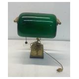bankers lamp with a green glass shade and