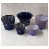 Ceramic and wooden flower pots.