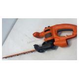 Electric Black & Decker hedge trimmer.