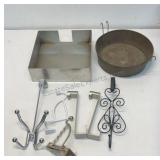 Assorted hangers and 2 metal pans.