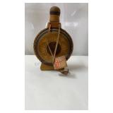 vintage wood-carved glass vessel decanter