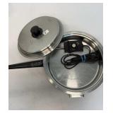 Stainless steel electric skillet.