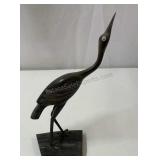 vintage hand-carved bird sculpture made of