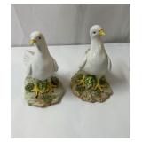 Pair of numbered ceramic doves made in Italy.