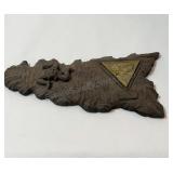 Wood and brass artwork of the island of Cicily