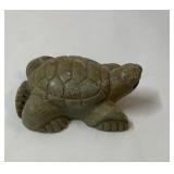 Hand carved stone by D Silversmiths 1999.