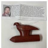 This is an authentic hand-carved red pipestone
