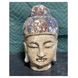 antique, hand-carved wooden Buddha head