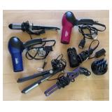 Group of hair dryers, curler & flat irons