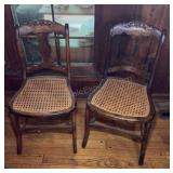 Pair of carved Back Cane Chairs