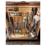 Contents of  kitchen utensil drawer.