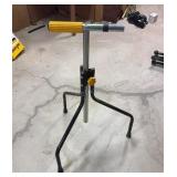 Adjustable Material Holder