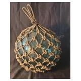 Japanese fishing buoy, blue green glass wrapped