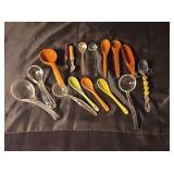 Assorted spoons. Wood ceramic glass plastic and