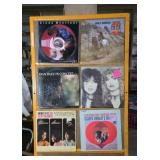 LPs. Female artists including Cher, Joan Baez,
