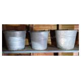 Galvanized buckets. All three buckets have holes