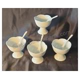 Porcelain sherbet cups and spoons. One cup has