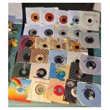 45rpm records. Some in original sleeves. Artists