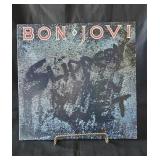 LP Bon Jovi "Slippery When Wet LP and cover in VG