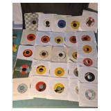45rpm records. Some in original sleeves. Artists