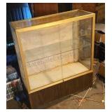Display cabinet with glass front and sides and