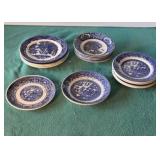 Assorted blue patterned dessert plates, shallow