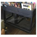 LP display rack with storage underneath. On
