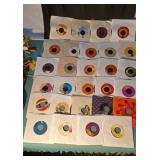 45rpm records. Some in original sleeves. Artists