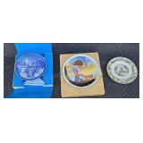 Assorted collectible plates.