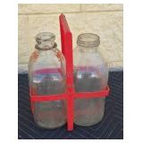 Plastic milk bottle holder with two ï¿½ gallon