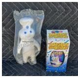 Pillsbury Doughboy doll in plastic and Pillsbury