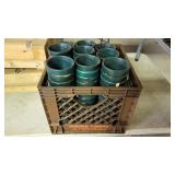 Crate of small plant pots