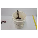 Bucket of misc chains