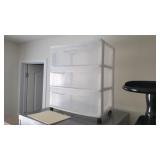 Plastic storage cabinet on casters