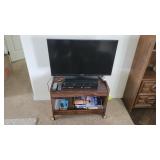 Samsung television, Funai VCR/DVD and stand