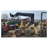 New Holland 555 skid loader