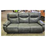 Leather power reclining sofa
