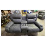 Leather reclining love seat