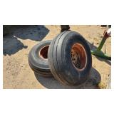 (2) 14x16.1 implement tires on 8 bolt rims