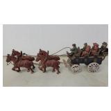 Cast iron 4 horse hitch, wagon and passengers